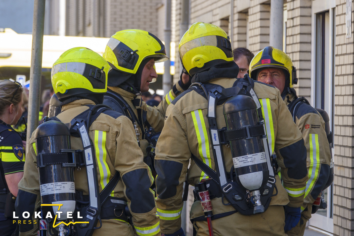 Portiek ontruimd na woningbrand in Centrum