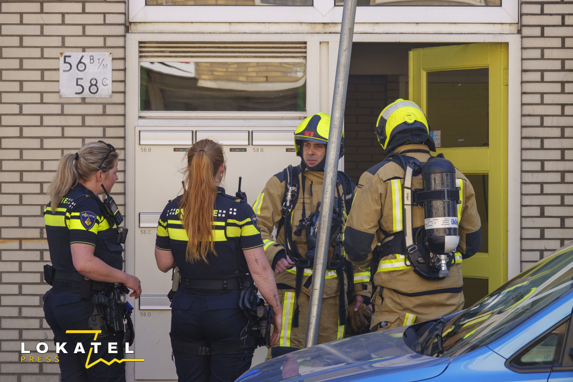 Portiek ontruimd na woningbrand in Centrum